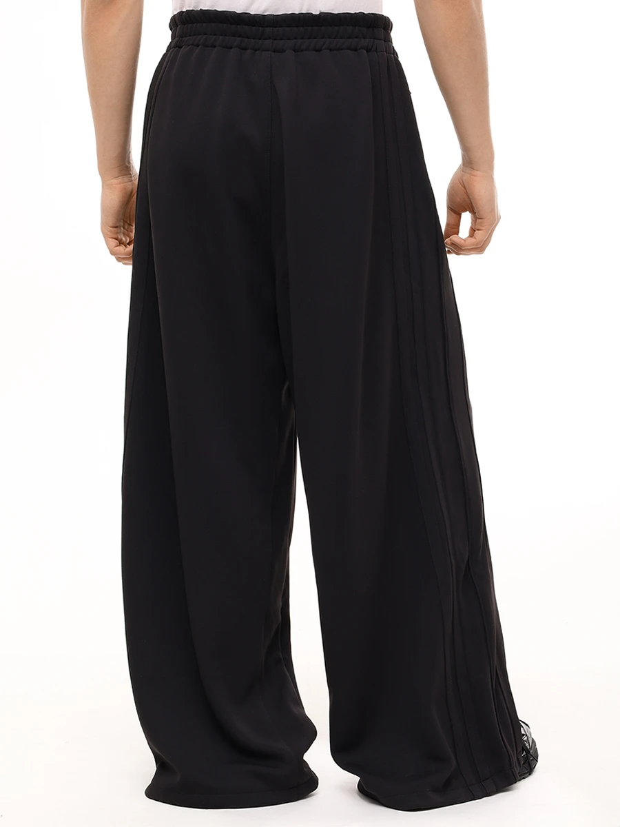 Брюки однотонные VETEMENTS UA65PA440B Черный  Фото 3