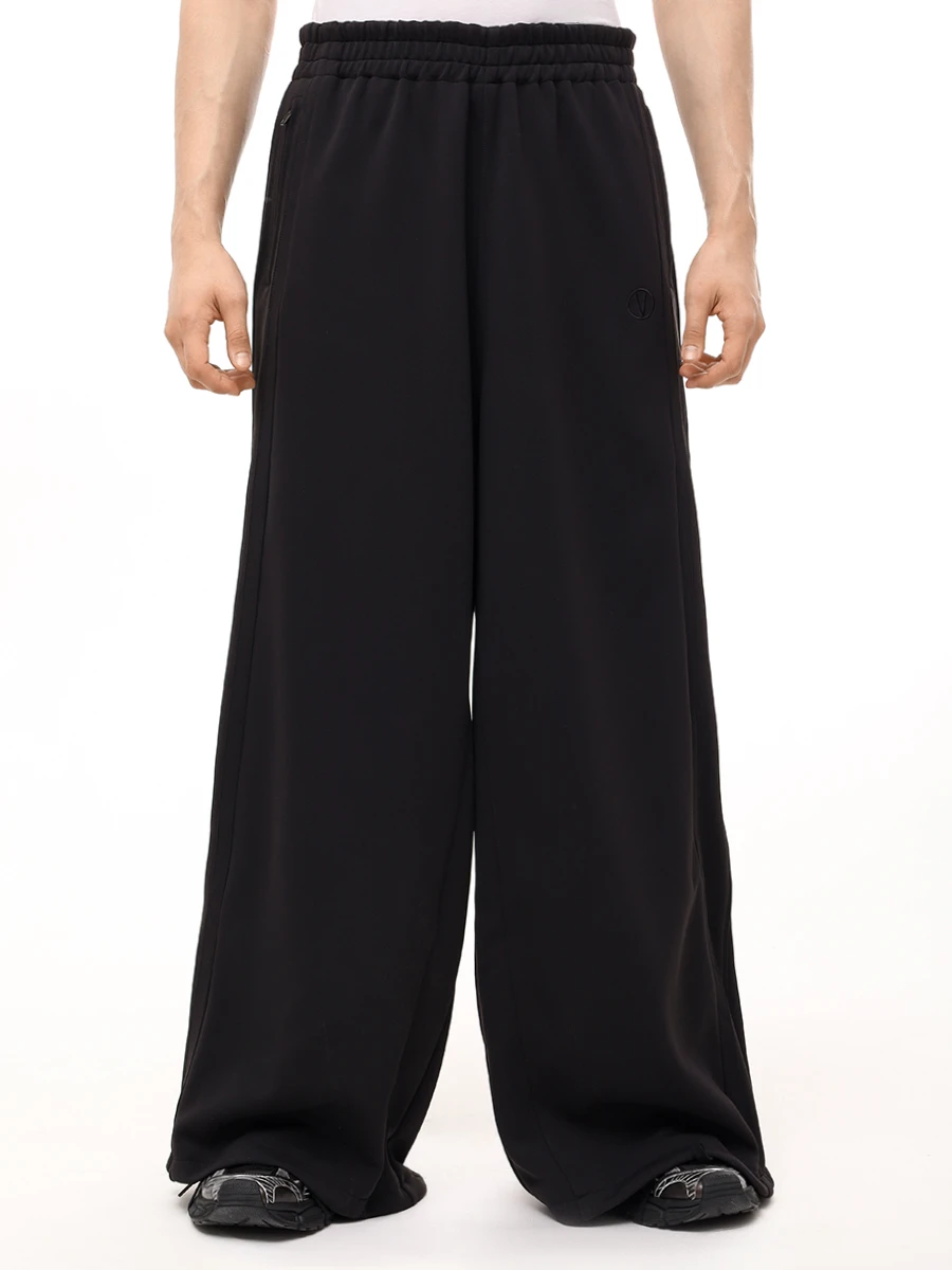 Брюки однотонные VETEMENTS UA65PA440B Черный  Фото 4