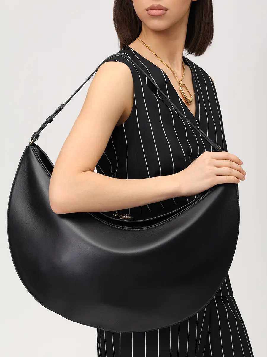 Сумка кожаная La Sac Ovalo JACQUEMUS 25HBAW00437AC18A08 990 Черный  Фото 2