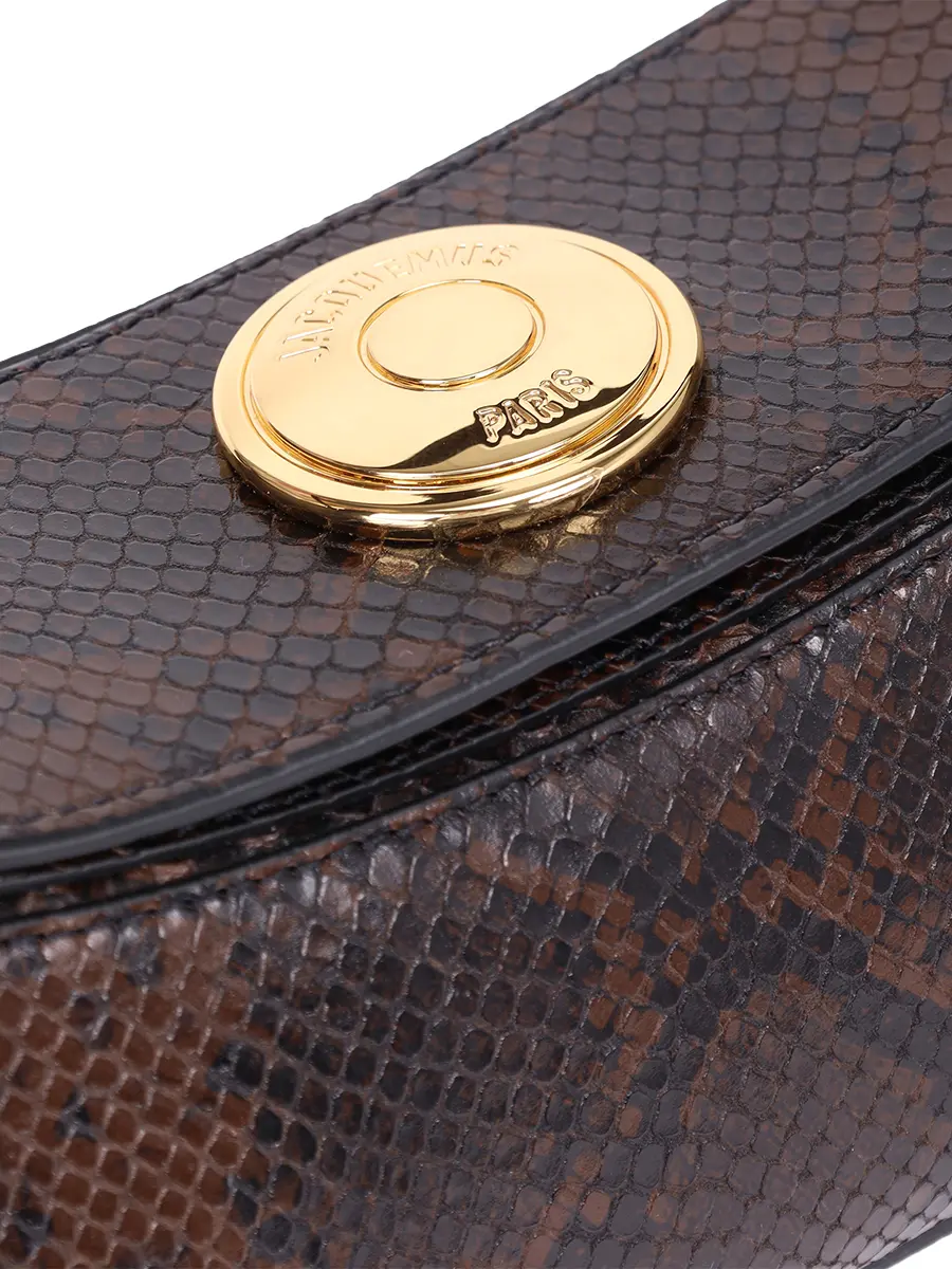 Сумка кожаная La Pochette Ovalo JACQUEMUS 25HBAW00438AC05A01 880 Коричневый  Фото 6
